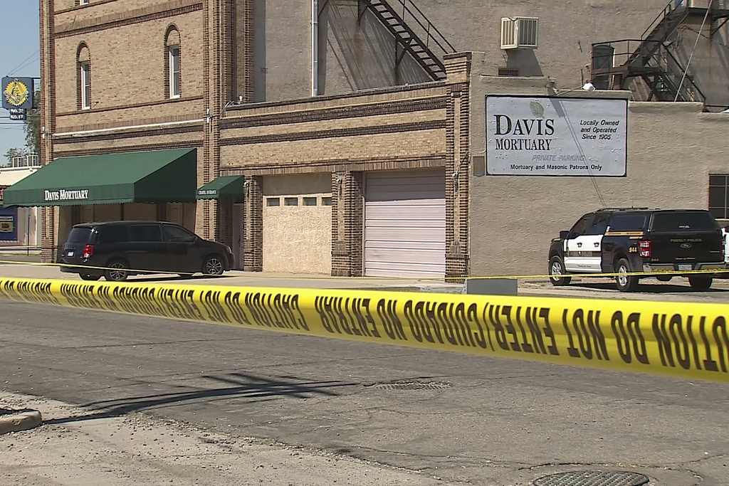 This image from video provided by KRDO13 shows Davis Mortuary in Pueblo, Colo., on Thursday, Aug. 21, 2025, where state inspectors found decomposing bodies behind a hidden door. (KRDO13 via AP)