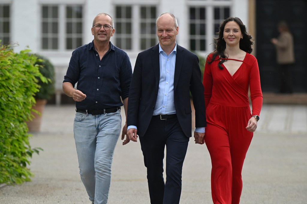 Peder Hvelplund, Pelle Dragsted and Victoria Velasquez of the Red-Green Alliance walk after a meeting with the four parties who annonced they will form a Danish government, at the Prime Ministers residence Marienborg in Kgs. Lyngby, Denmark, Tuesday, June 2, 2026. (Nils Meilvang/Ritzau Scanpix via AP)