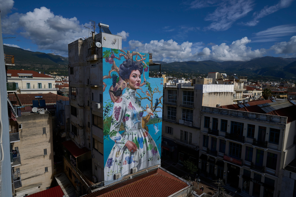 A building with the mural entitled 'Kalamata' depicting opera legend Maria Callas by artist Kleomenis Kostopoulos is seen in Kalamata town, about 240 kilometers (150 miles) southwest of Athens, Monday, Feb. 9, 2026. (AP Photo/Petros Giannakouris)
