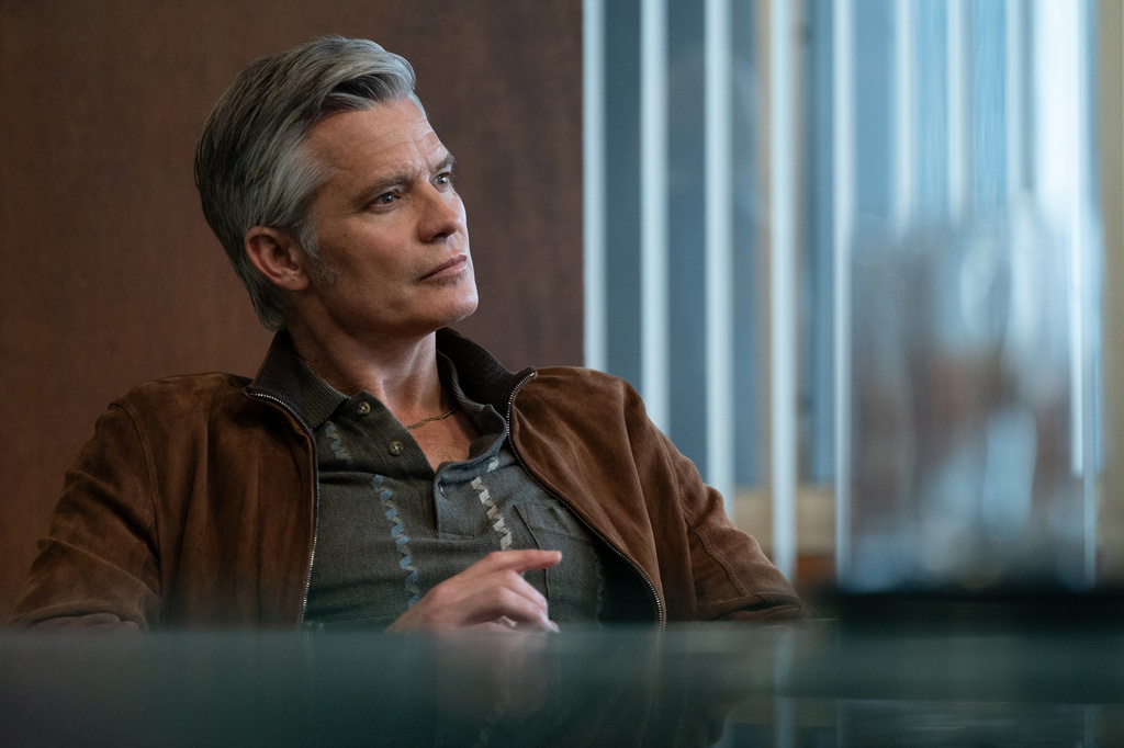 This image released by Apple TV shows Timothy Olyphant in a scene from "Lucky." (Jessica Brooks/Apple TV via AP)
