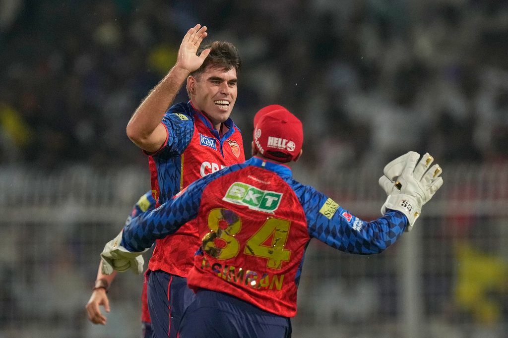 Punjab Kings' Xavier Bartlett celebrates the wicket of Kolkata Knight Riders' Cameron Green during the Indian Premier League cricket match between Kolkata Knight Riders and Punjab Kings in Kolkata , India, Monday, April 6, 2026. (AP Photo/Bikas Das)