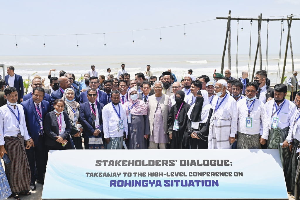 Chief Adviser Professor Muhammad Yunus, a Nobel Peace Prize laureate, middle, attends a stakeholders' dialogue on the Rohingya situation in Cox's Bazar, Bangladesh, on Monday, Aug. 25, 2025. (AP Photo/Mahmud Hossain Opu)