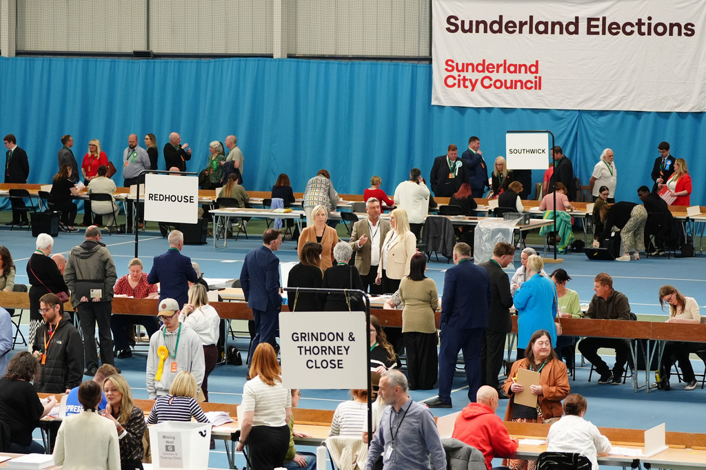 Votes are counted for the 2026 local elections at the Silksworth Sports Complex in Sunderland, England, Friday, May 8, 2026. (Owen Humphreys/PA Wire/PA via AP)