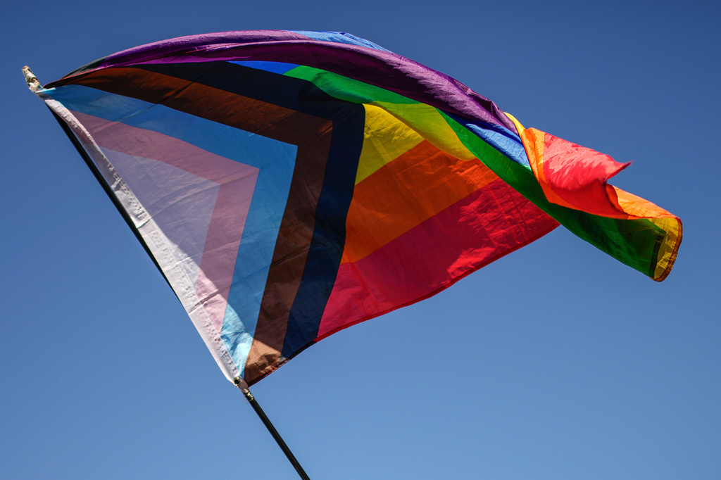 FILE - A pride flag is held during the annual LGBTQ+ Pride March in Istanbul, June 30, 2024. (AP Photo/Emrah Gurel, File)