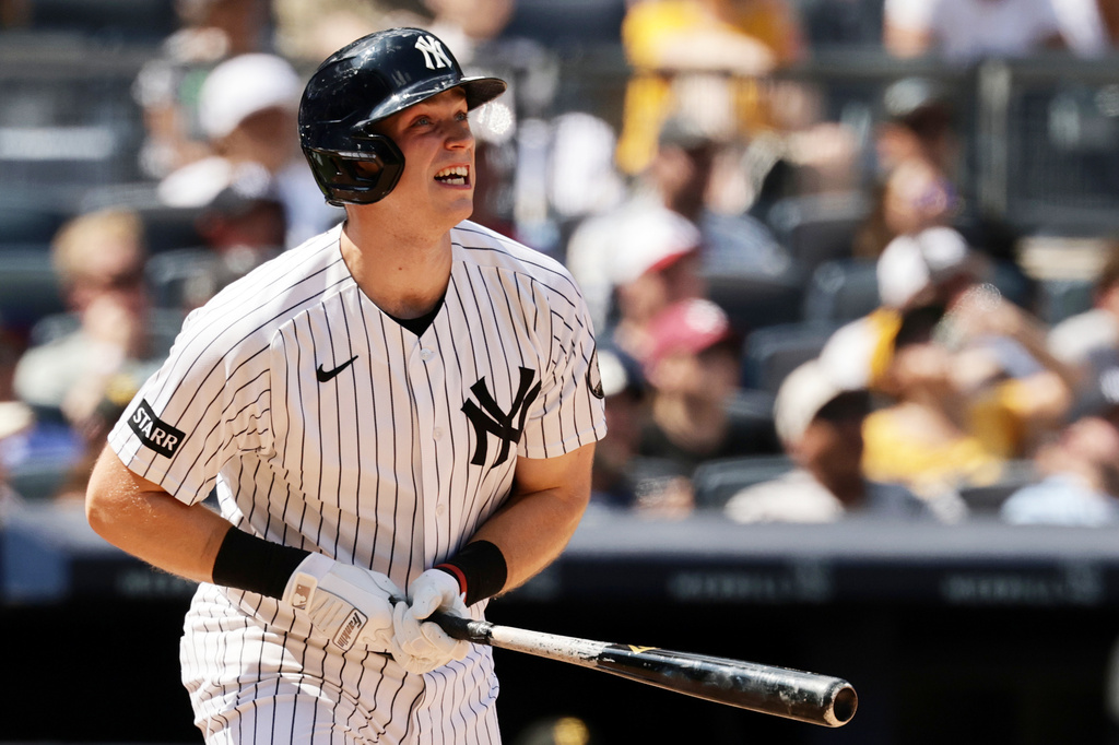 New York Yankees' Ben Rice watches his three-run home run in the seventh inning during the first baseball game of a doubleheader against the Pittsburgh Pirates, Wednesday, July 22, 2026, in New York. (AP Photo/Adam Hunger)