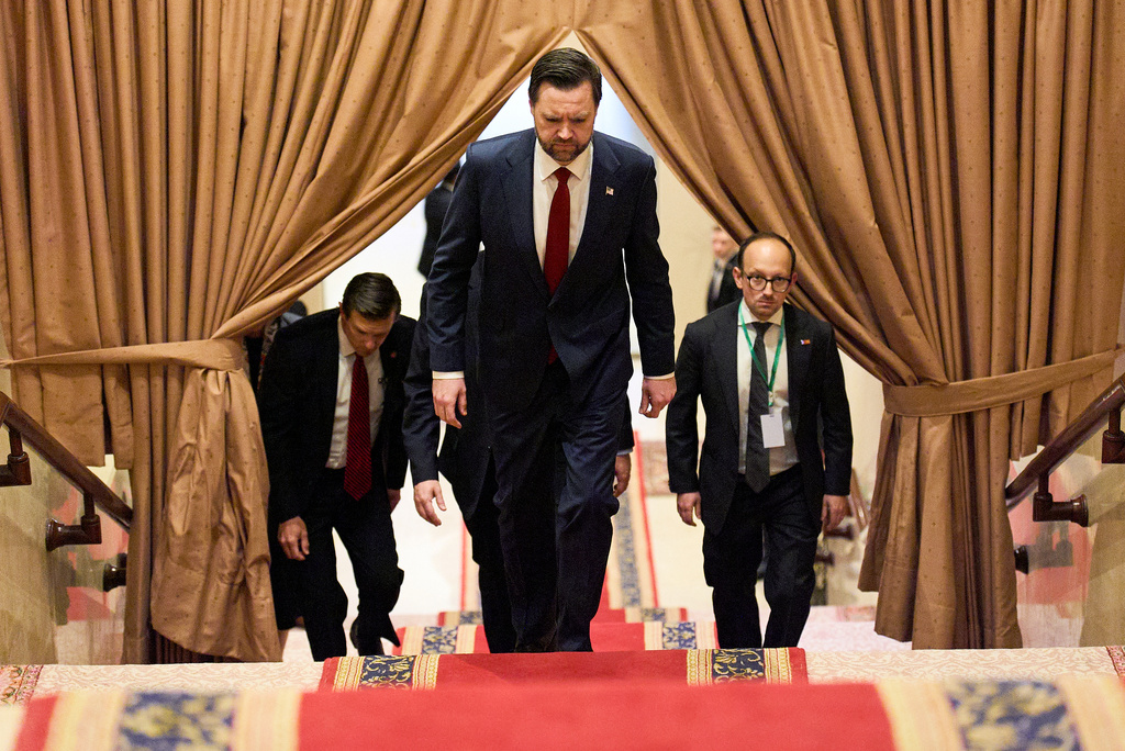 Vice President JD Vance, center, walks up a flight of stairs to meet with Pakistan's Prime Minister Shehbaz Sharif for talks about Iran, Saturday, April 11, 2026, in Islamabad. (AP Photo/Jacquelyn Martin, Pool)