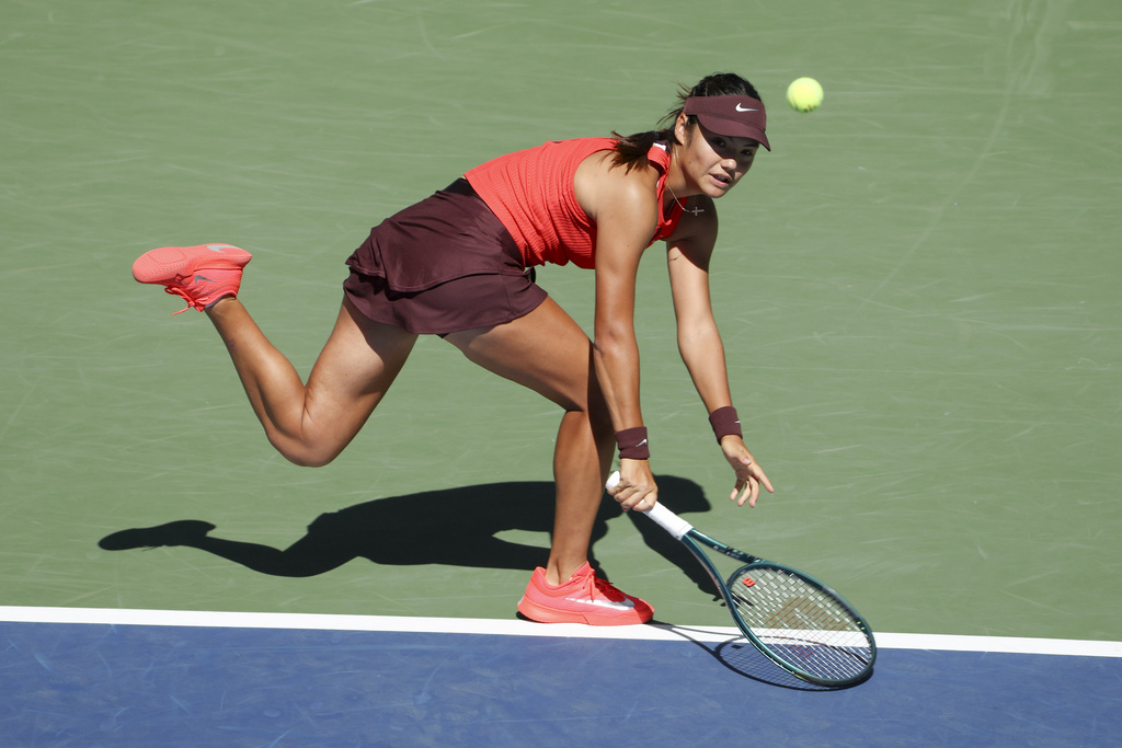 Emma Raducanu, of Great Britain, returns a shot to Janice Tjen, of Indonesia, during the second round of the U.S. Open tennis championships, Wednesday, Aug. 27, 2025, in New York. (AP Photo/Andres Kudacki)
