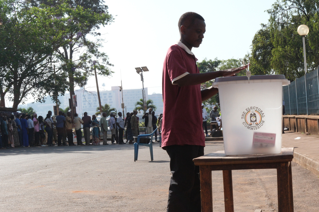A man casts his vote at a polling station in the capital, Kampala, Uganda, Thursday, Jan. 15, 2026. (AP Photo/Hajarah Nalwadda)