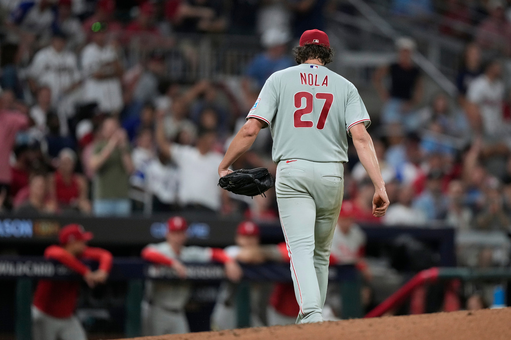 Philadelphia Phillies pitcher Aaron Nola is pulled against the Atlanta Braves in the second inning during Game 3 of baseball's NL Wild Card Series, Thursday, Oct. 1, 2026, in Atlanta. (AP Photo/Brynn Anderson)