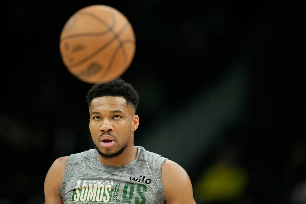 Milwaukee Bucks' Giannis Antetokounmpo warms up before an NBA basketball game against the Boston Celtics, Monday, March 2, 2026, in Milwaukee. (AP Photo/Aaron Gash)