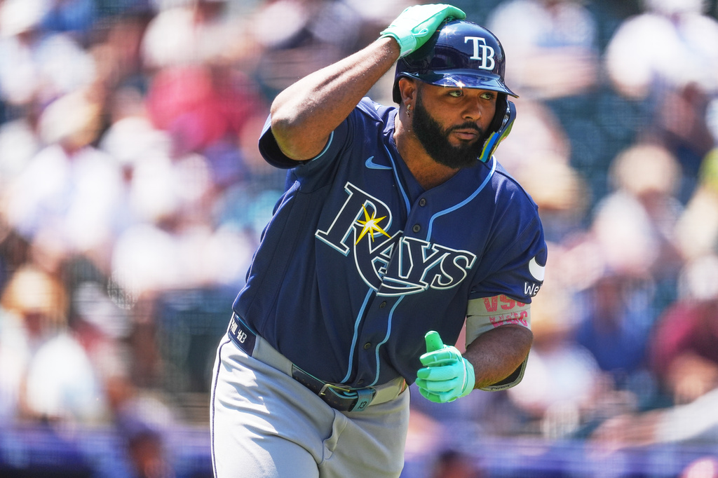 Tampa Bay Rays' Junior Caminero heads up the first-base line after hitting a solo home run off Colorado Rockies starting pitcher Tomoyuki Sugano in the third inning of a baseball game in Denver, Wednesday, Aug. 5, 2026. (AP Photo/David Zalubowski)