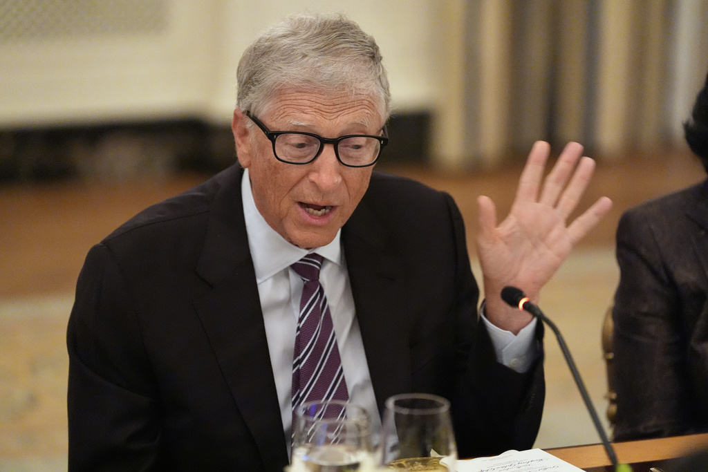Microsoft's Bill Gates speaks during a dinner with President Donald Trump in the State Dinning Room of the White House, Thursday, Sept. 4, 2025, in Washington. (AP Photo/Alex Brandon)