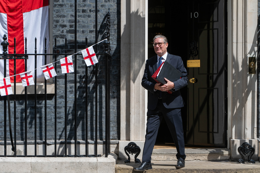 Britain's Prime Minister Keir Starmer leaves 10 Downing Street to attend Prime Minister's Questions at the House of Commons in London, Wednesday, July 15, 2026. (AP Photo/Thomas Krych)