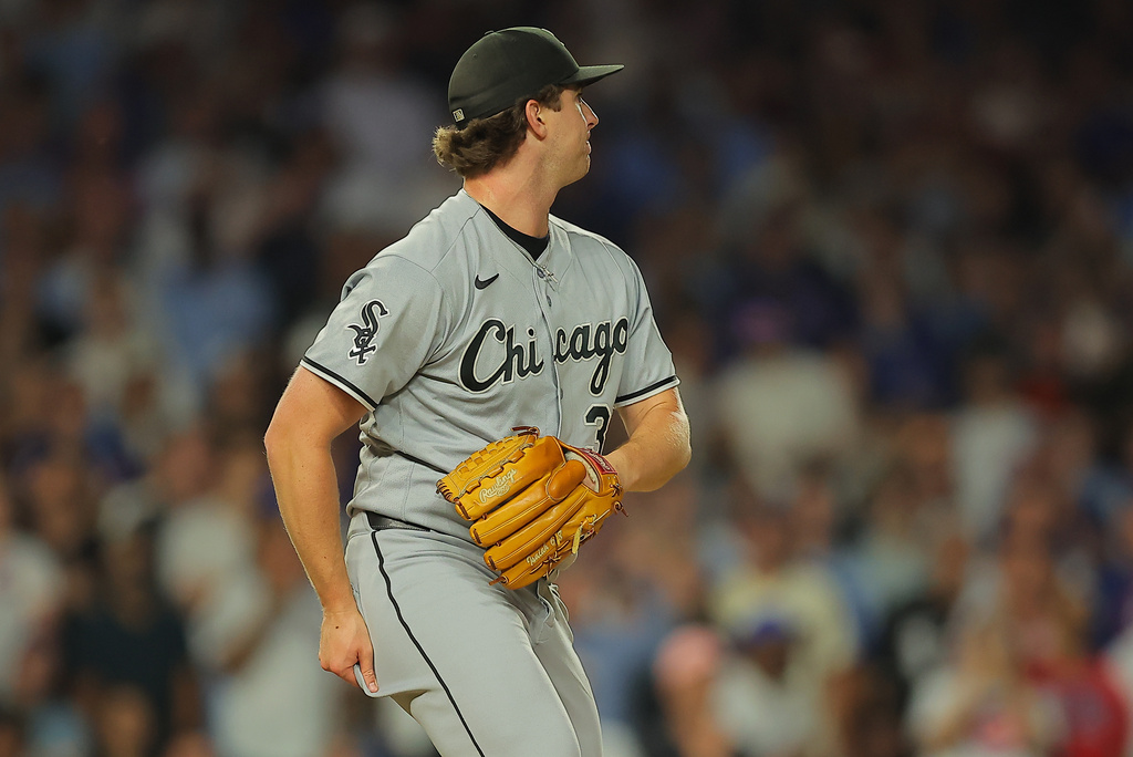 Chicago White Sox's Grant Taylor watches Chicago Cubs' Alex Bregman RBI single during the seventh inning of a baseball game, Tuesday, Aug. 18, 2026, in Chicago. (AP Photo/Melissa Tamez)