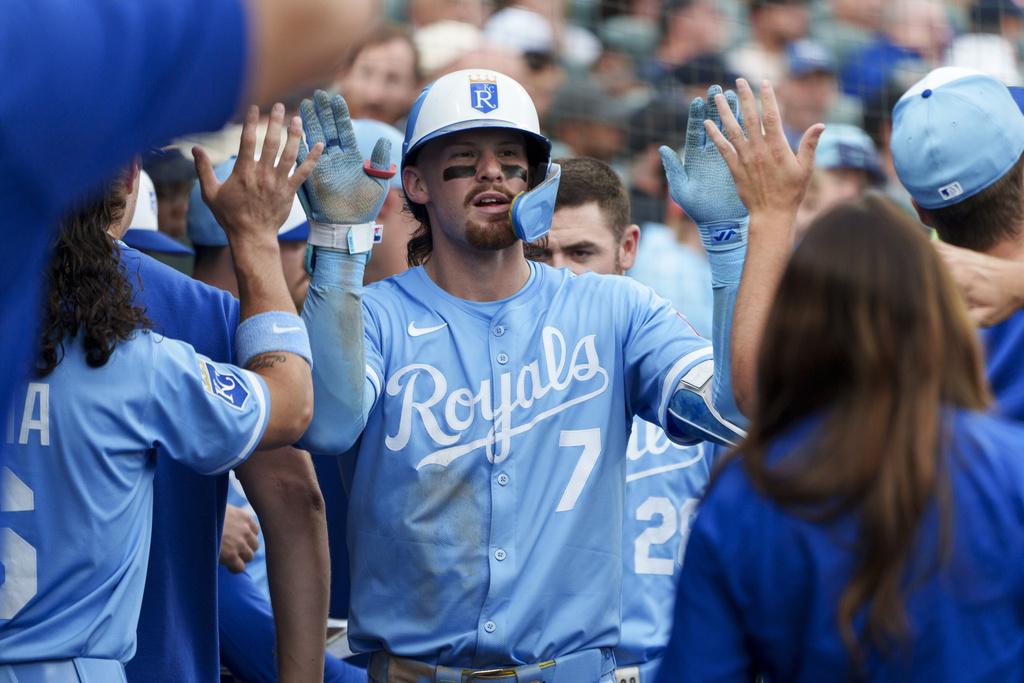 Kansas City Royals' Bobby Witt Jr. (7) celebrates a home run score during the sixth inning of a baseball game against the Detroit Tigers, Saturday, Aug. 23, 2025, in Detroit. (AP Photo/Josh Boland )