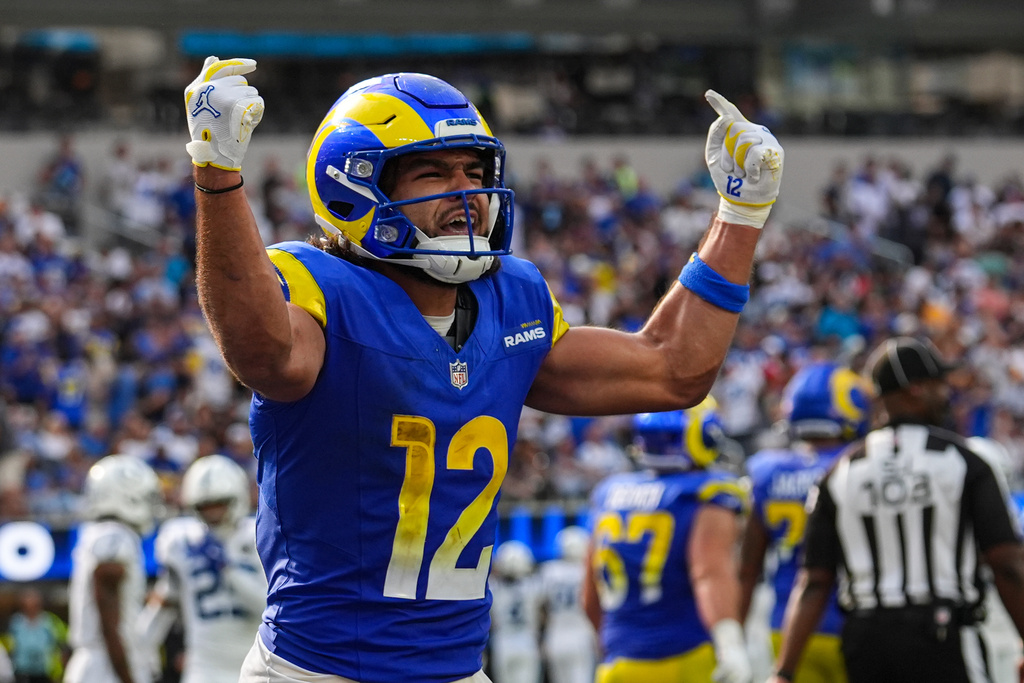 Los Angeles Rams wide receiver Puka Nacua (12) celebrates after a touchdown catch against the Indianapolis Colts during the second hall of an NFL football game Sunday, Sept. 28, 2025, in Inglewood, Calif. (AP Photo/Marcio Jose Sanchez)