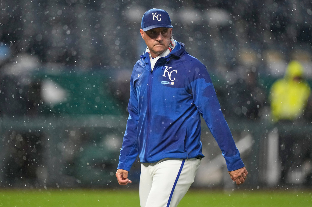 Kansas City manager Matt Quatraro walks to the dugout after making a pitching change during the ninth inning of a baseball game against the Minnesota Twins, Wednesday, April 1, 2026, in Kansas City, Mo. (AP Photo/Charlie Riedel)