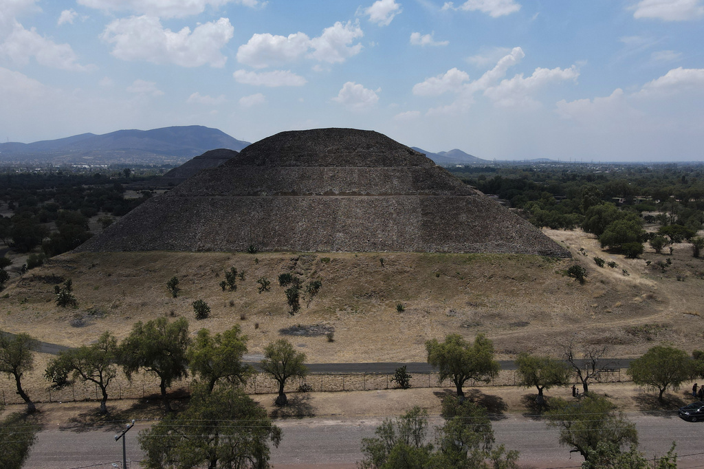 The Pyramid of the Moon at Teotihuacan remains closed to visitors a day after a gunman opened fire on tourists at the archaeological site on the outskirts of Mexico City, Tuesday, April 21, 2026.. (AP Photo/Marco Ugarte)