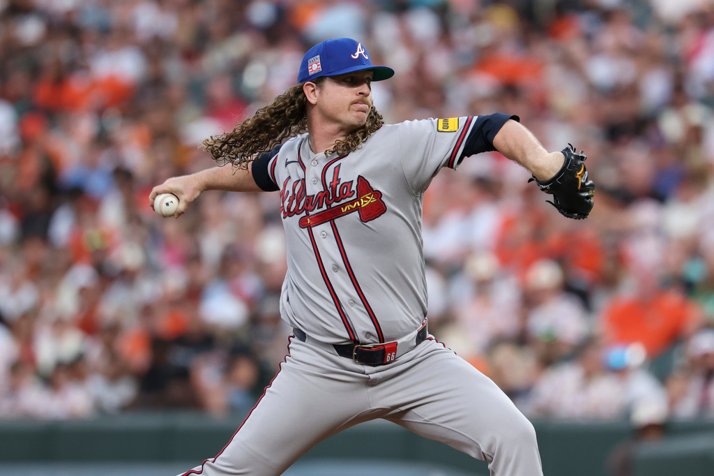 Atlanta Braves pitcher Grant Holmes throws during the third inning of a baseball game against the Baltimore Orioles, Friday, July 24, 2026, in Baltimore. (AP Photo/Terrance Williams)