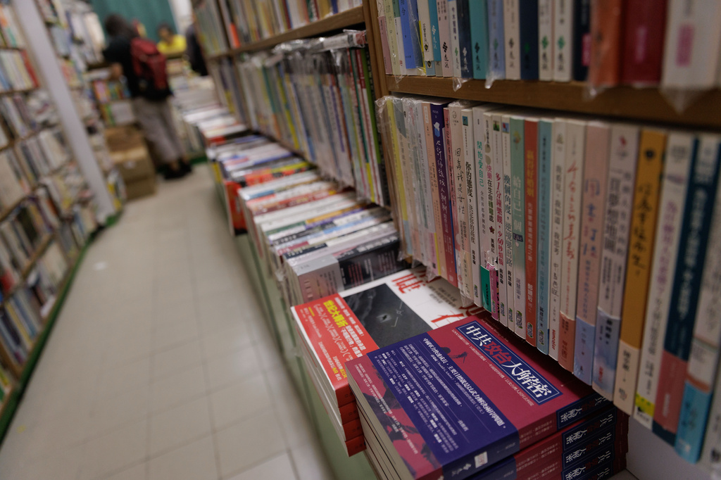 Books including one titled " The CCP's Plan to Attack Taiwan: A Comprehensive Reveal" can be seen at Greenfield Bookstore in Hong Kong, Friday, Aug. 14, 2026. (AP Photo/May James)