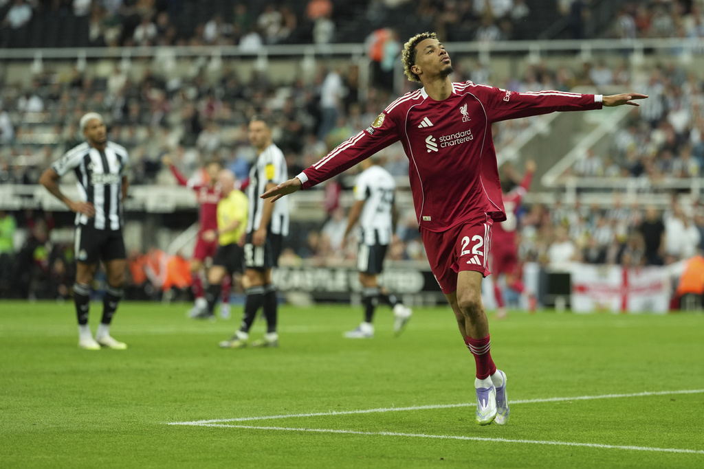 Liverpool's Hugo Ekitike celebrates after scoring during the Premier League soccer match between Newcastle and Liverpool in Newcastle, England, Monday, Aug. 25, 2025. (AP Photo/Jon Super)