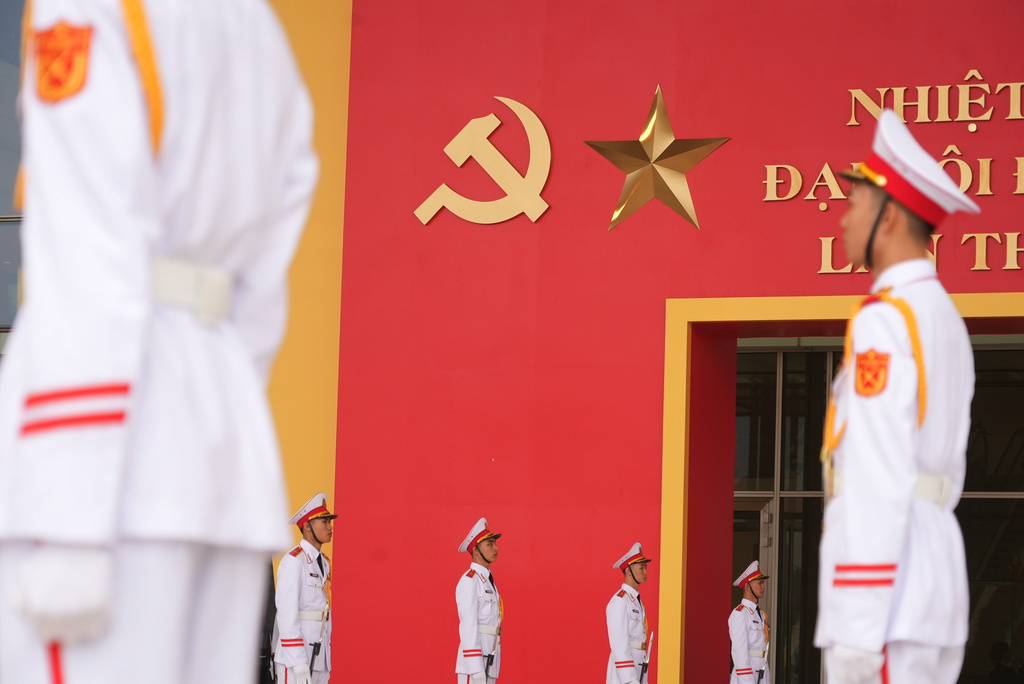Honor guards stand in position at the National Convention Center for the week-long Congress of the Communist Party of Vietnam in Hanoi, Vietnam, Monday, Jan. 19, 2026. (AP Photo/Hau Dinh)