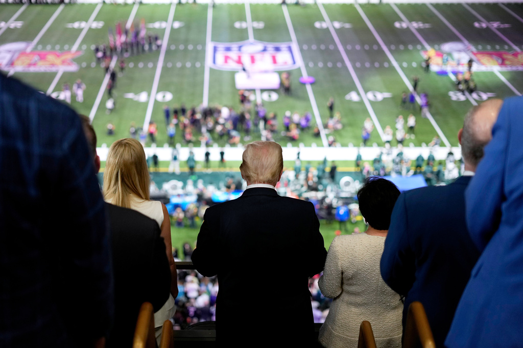 FILE - President Donald Trump, center, attends the NFL Super Bowl 59 football game between the Philadelphia Eagles and the Kansas City Chiefs, Feb. 9, 2025, in New Orleans. (AP Photo/Ben Curtis, File)