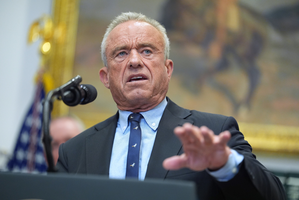 Secretary of Health and Human Services, Robert F. Kennedy, Jr., speaks during an event on prescription drug prices in the Roosevelt Room of the White House, Friday, Dec. 19, 2025, in Washington. (AP Photo/Evan Vucci)