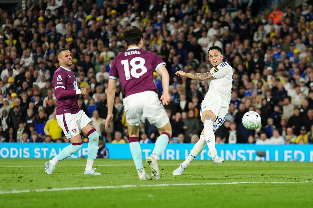 Leeds United's Noah Okafor, right, scores their side's second goal during the Premier League match between Leeds United and Burnley, in Leeds, England, Friday, May 1, 2026. (Martin Rickett/PA via AP)