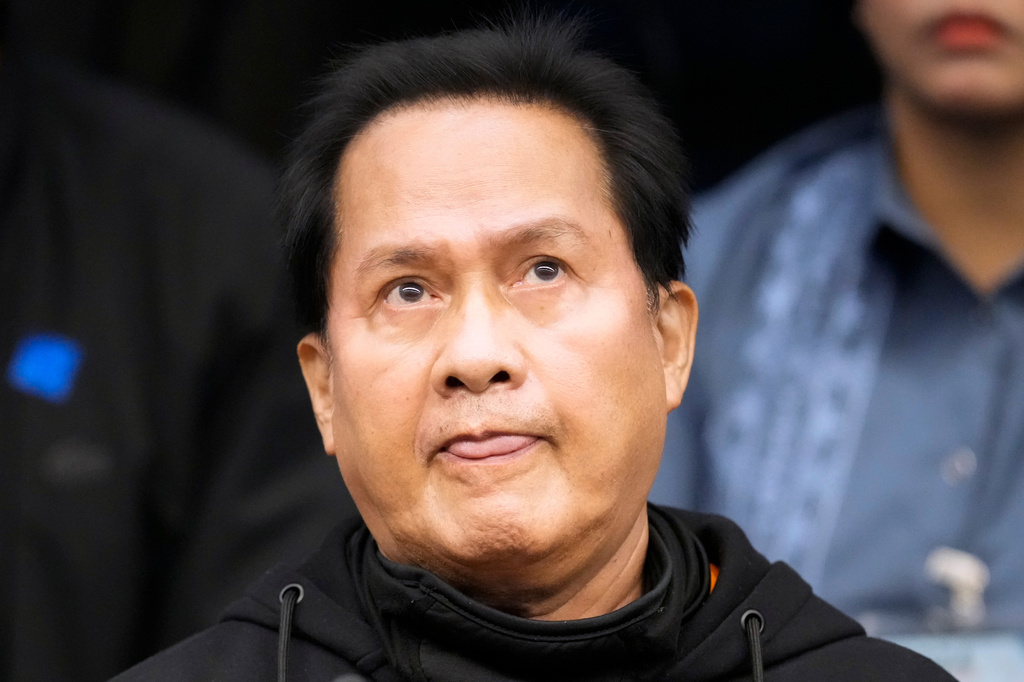FILE - Apollo Quiboloy, a detained Filipino preacher accused of sexual abuse and human trafficking in the Philippines and similar charges in the United States, listens as he attends a senate inquiry at the Philippine Senate on Wednesday, Oct. 23, 2024, in Manila, Philippines. (AP Photo/Aaron Favila,File)