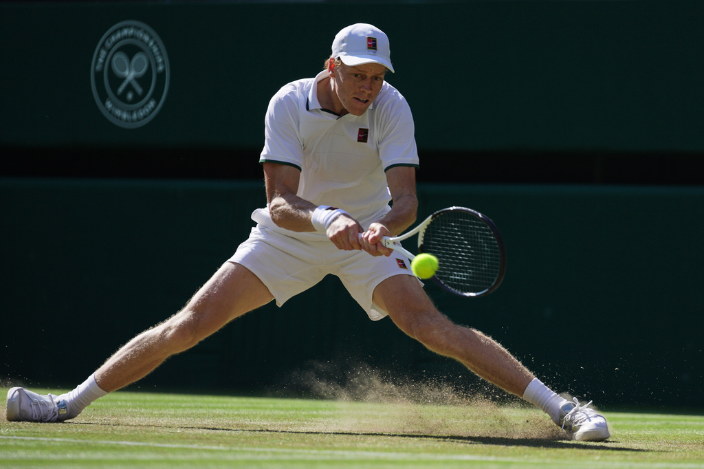 Jannik Sinner of Italy plays a return during the third round men's singles match against Jenson Brooksby of the United States at the Wimbledon Tennis Championships in London, Friday, July 3, 2026.(AP Photo/Brian Inganga)