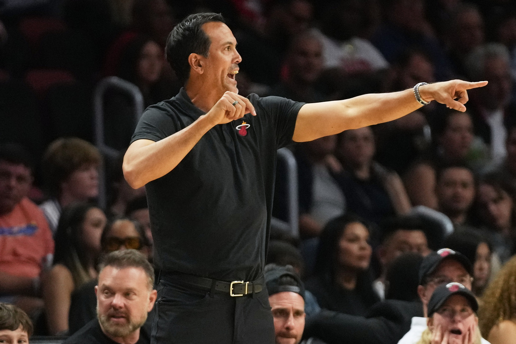 Miami Heat head coach Erik Spoelstra watches during the first half of an NBA basketball game against the Portland Trail Blazers, Saturday, Nov. 8, 2025, in Miami. (AP Photo/Lynne Sladky)