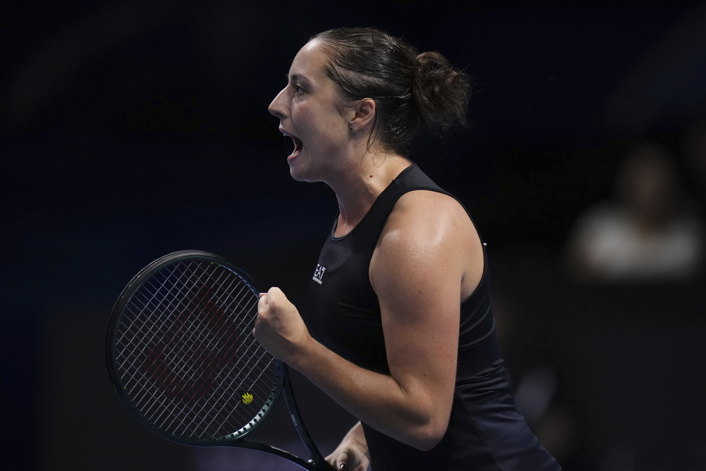 Elisabetta Cocciaretto, of Italy reacts after winning a break point against Emma Navarro, of the United States during the Billie Jean King Cup final tennis match, at the Shenzhen Bay Sports Center Arena, in Shenzhen, China's Guangdong province, Sunday, Sept. 21, 2025. (AP Photo/Andy Wong)