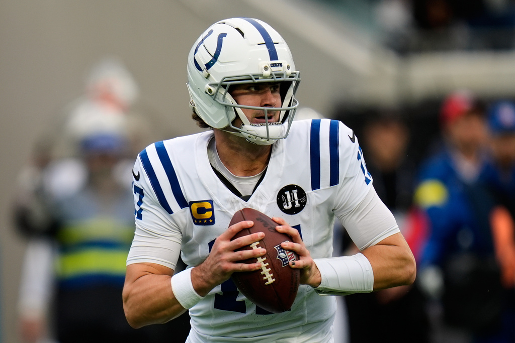 FILE - Indianapolis Colts quarterback Daniel Jones looks for a receiver during the first half of an NFL football game against the Jacksonville Jaguars, Dec. 7, 2025, in Jacksonville, Fla. (AP Photo/John Raoux, File)