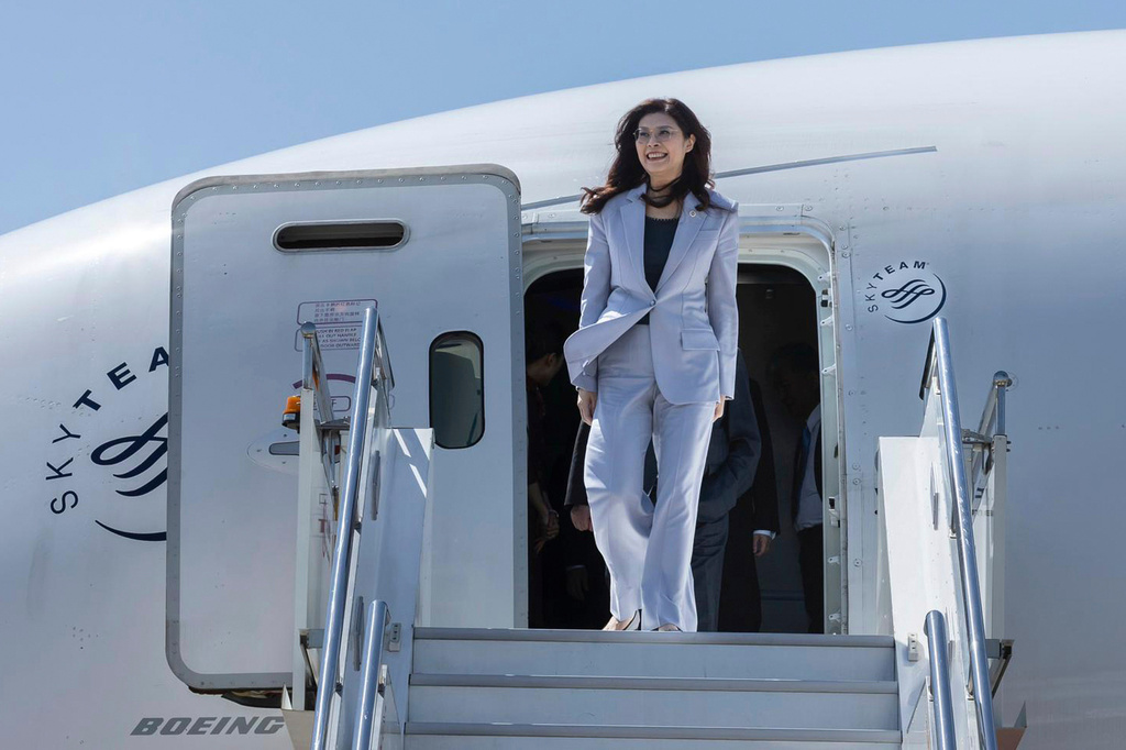 In this photo released by Kuomintang, Taiwan's Kuomintang (KMT) leader Cheng Li-wun arrives in Shanghai, China Tuesday, April 7, 2026. (Kuomintang via AP)
