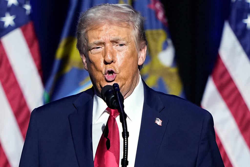 President Donald Trump speaks at the Detroit Economic Club, Tuesday, Jan. 13, 2026 in Detroit. (AP Photo/Ryan Sun)