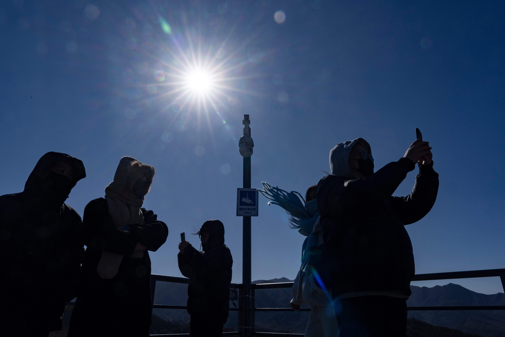 A security camera monitors visitors to the Great Wall of China on the outskirts of Beijing, Tuesday, Feb. 25, 2025. (AP Photo/Ng Han Guan)