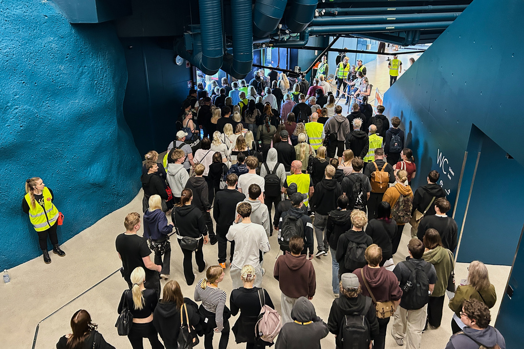 People enter a shelter designed to withstand chemical, nuclear and biological attacks during at civil defense exercise in Kuopio, Finland, Wednesday, Sept. 2, 2026. (AP Photo/Emma Burrows)
