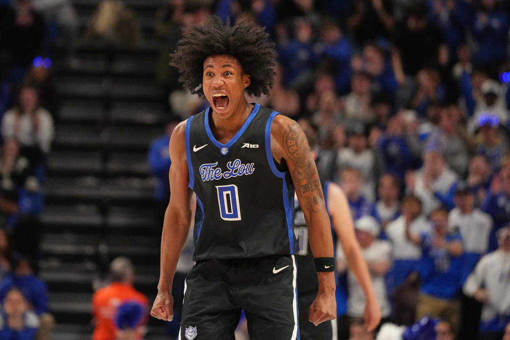 Saint Louis' Kellen Thames celebrates after scoring during the second half of an NCAA college basketball game against George Washington Tuesday, Jan. 27, 2026, in St. Louis. (AP Photo/Jeff Roberson)