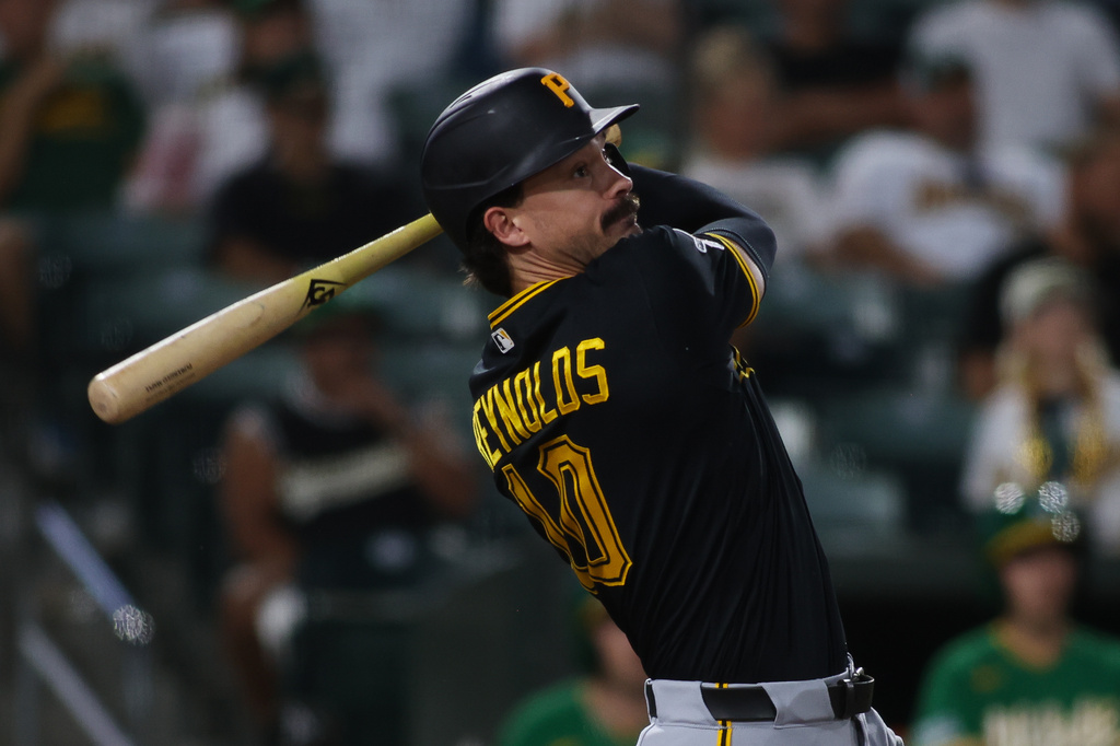 Pittsburgh Pirates' Bryan Reynolds hits a two run during the seventh inning of a baseball game against the Athletics Tuesday, June 16, 2026, in West Sacramento, Calif. (AP Photo/Scott Marshall)