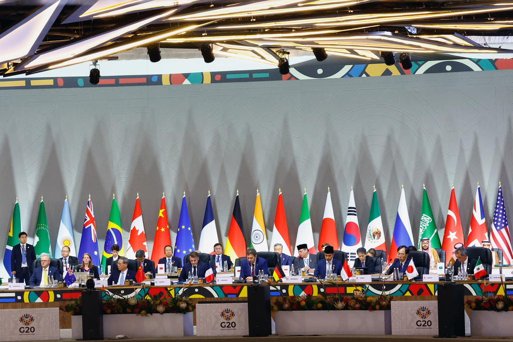 Leaders attend a plenary session on the opening day of the G20 Summit at the Nasrec Expo Centre, in Johannesburg, South Africa, Saturday, Nov. 22, 2025. (Thomas Mukoya/Pool Photo via AP)