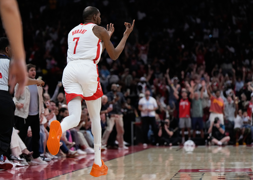 Houston Rockets forward Kevin Durant (7) celebrates after a 3-pointer during the second half of an NBA basketball game against the Miami Heat in Houston, Saturday, March 21, 2026. (AP Photo/Ashley Landis)