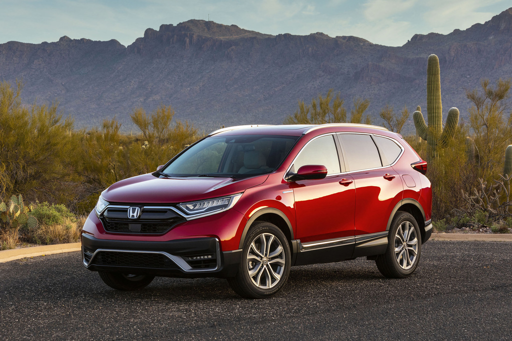 This photo provided by Honda shows the CR-V hybrid, a fuel-efficient compact SUV that can be found used for less than $25,000. (Courtesy of American Honda Motor Co. via AP)