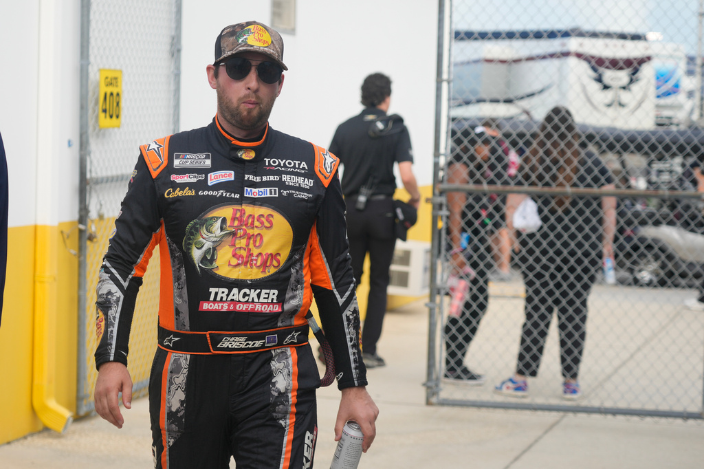 Chase Briscoe walks to the drivers meeting before a NASCAR Cup Series auto race at Daytona International Speedway, Saturday, Aug. 29, 2026, in Daytona Beach, Fla. (AP Photo/John Raoux)