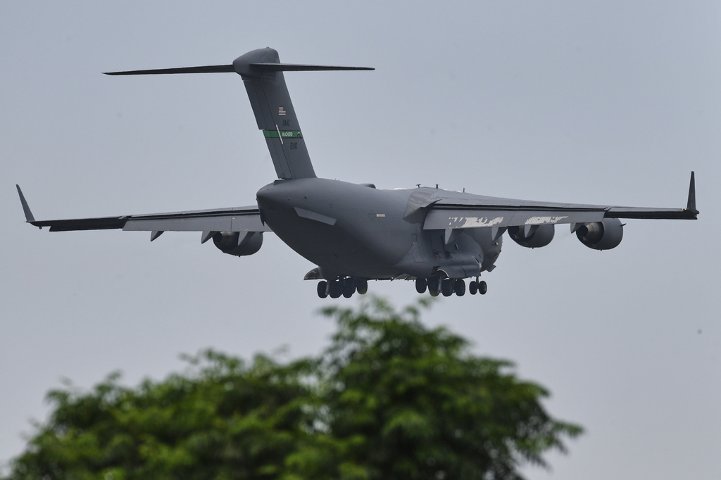 A U.S. Air Force Boeing C-17 Globemaster III transport aircraft prepares to land at Nur Khan airbase, ahead of second round of negotiations between the U.S. and Iran, in Rawalpindi, Pakistan, Monday, April 20, 2026. (AP Photo/Ehsan Shahzad)