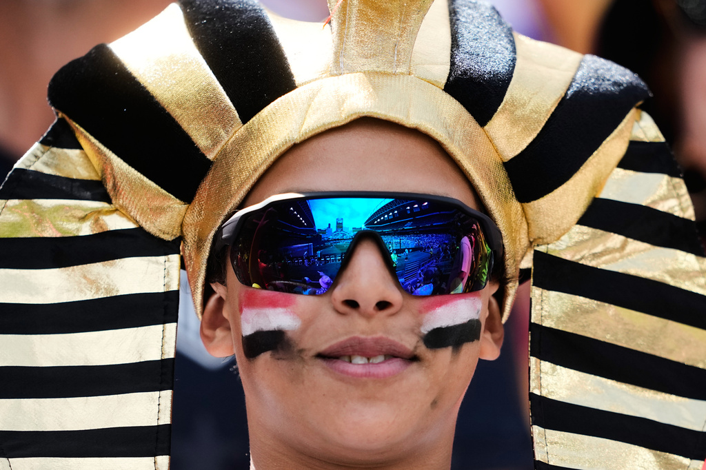 An Egypt fan smiles in the stands before the World Cup Group G soccer match between Egypt and Belgium in Seattle, Monday, June 15, 2026. (AP Photo/Lindsey Wasson)