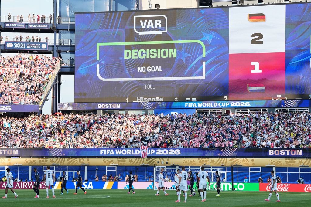 The screen shows that a goal by Germany's Jonathan Tah (4) was disqualified after a VAR check during the World Cup round of 32 soccer match between Germany and Paraguay in Foxborough, Mass., near Boston, Monday, June 29, 2026. (AP Photo/Martin Meissner)