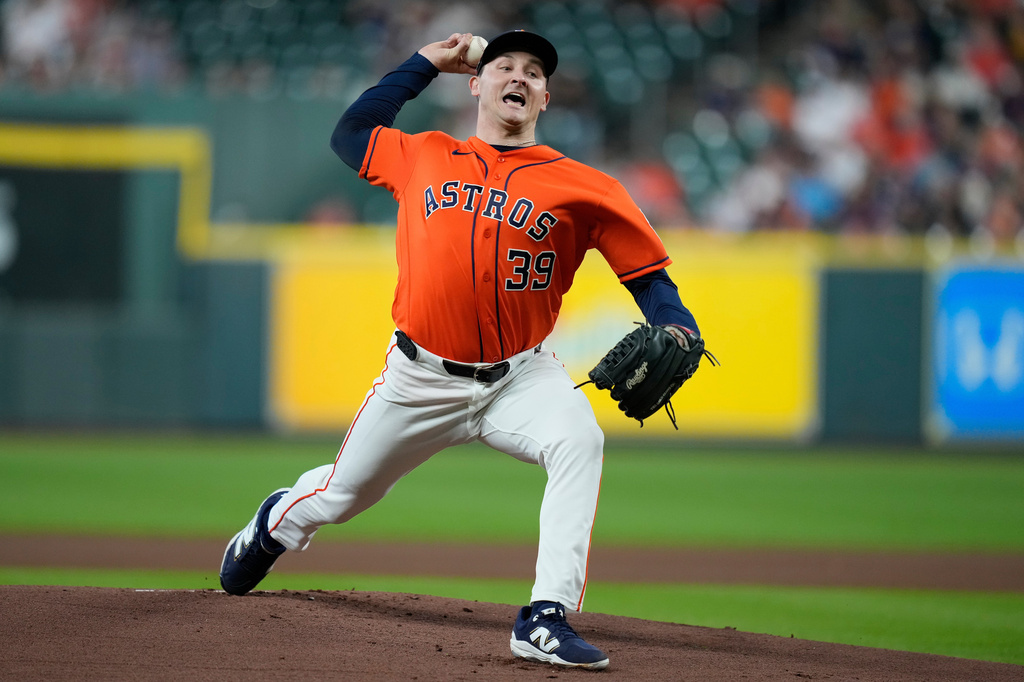 Houston Astros pitcher Hayden Wesneski delivers during the first inning of a baseball game against the Athletics, Friday, Aug. 21, 2026, in Houston. (AP Photo/Kevin M. Cox)