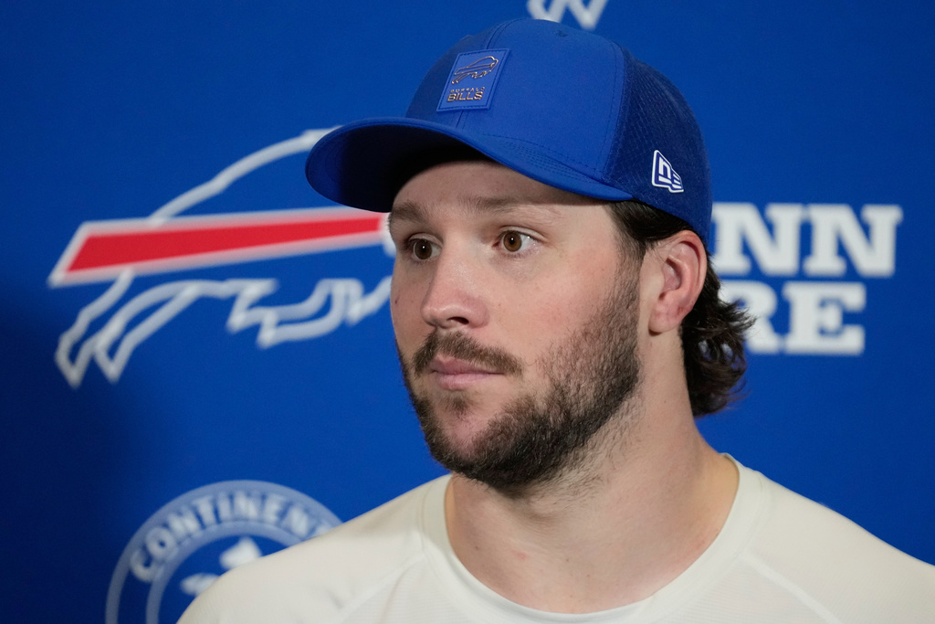 Buffalo Bills quarterback Josh Allen talks to reporters following an NFL wild-card playoff football game against the Jacksonville Jaguars Sunday, Jan. 11, 2026, in Jacksonville, Fla. (AP Photo/Chris O'Meara)