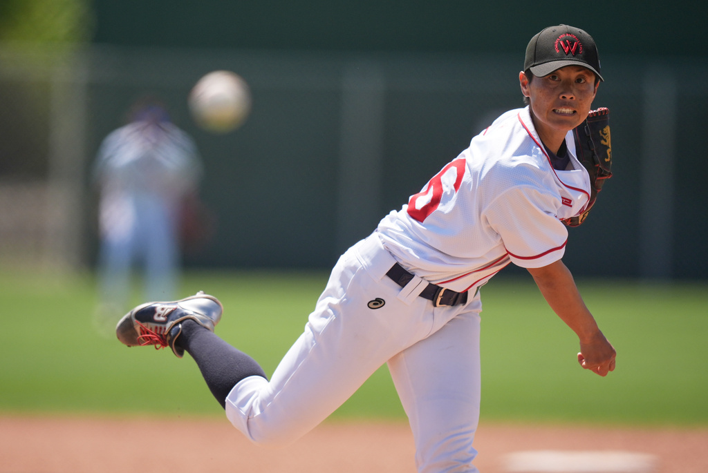 Ayami Sato pitches during a Women's Pro Baseball League exhibition game, Thursday, March 19, 2026, in Fort Myers, Fla. (AP Photo/Rebecca Blackwell)